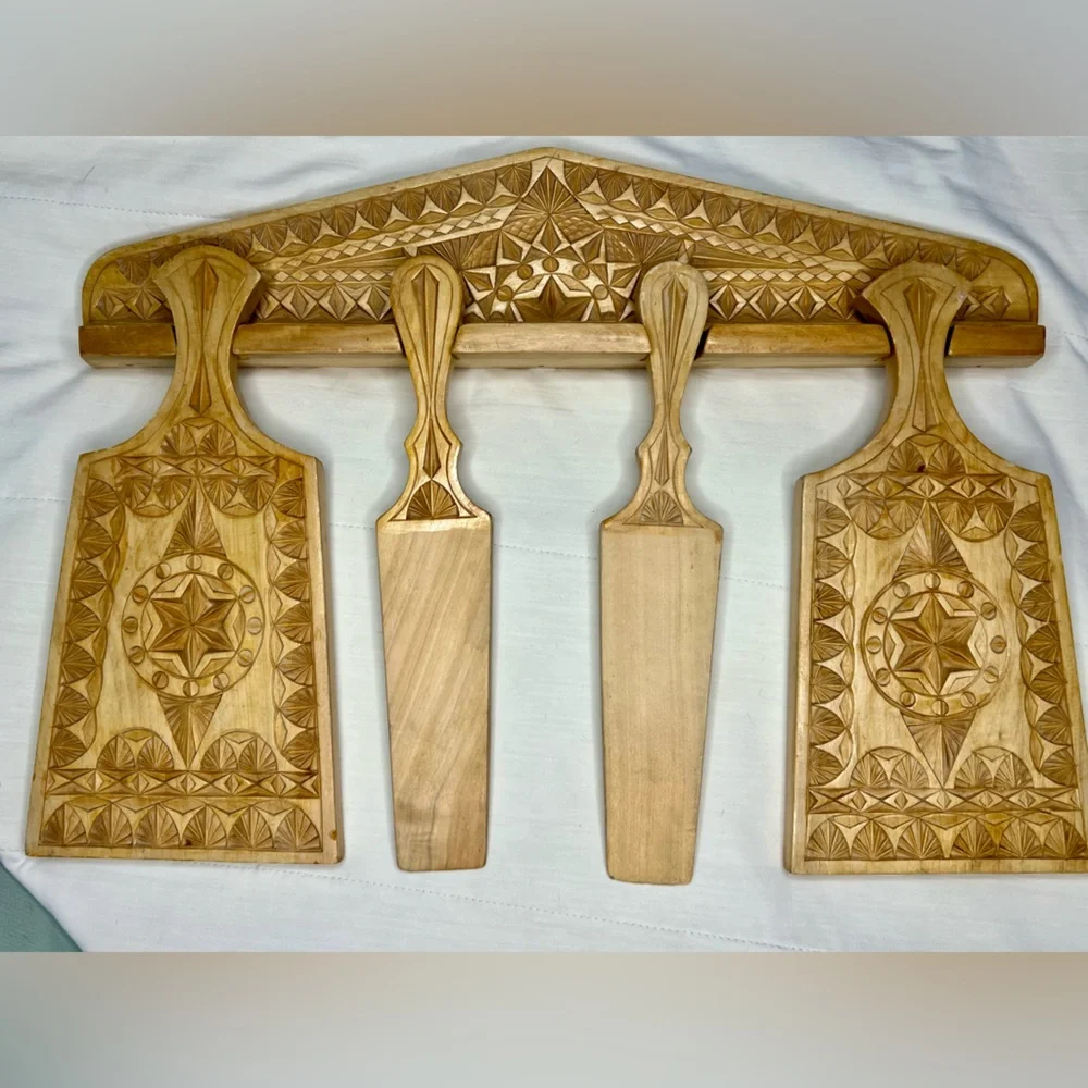 Handcrafted Wooden Wall Decor with Intricate Carvings